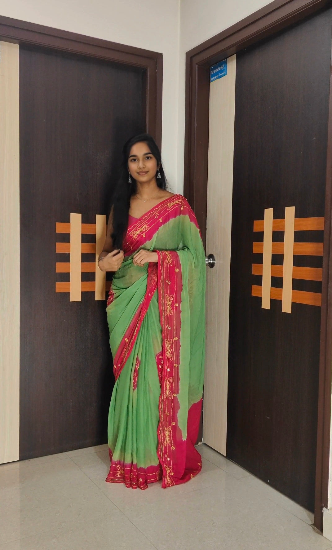 Green and pink georgette saree